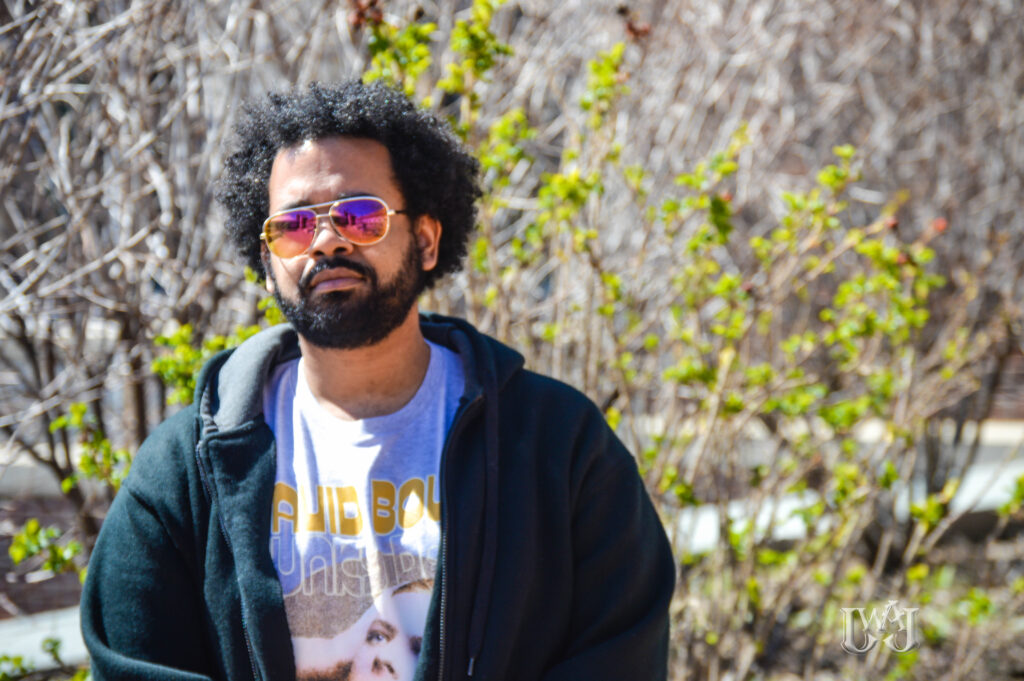 Rashid Darden in a hoodie and sunglasses.